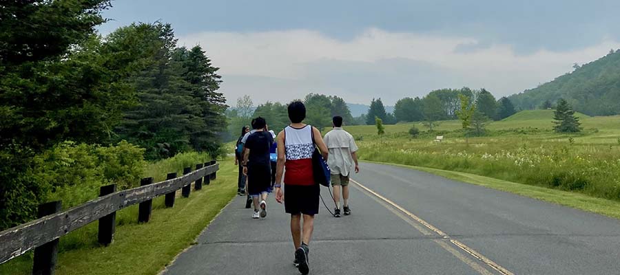 HLAB Team Walking on the Road Image